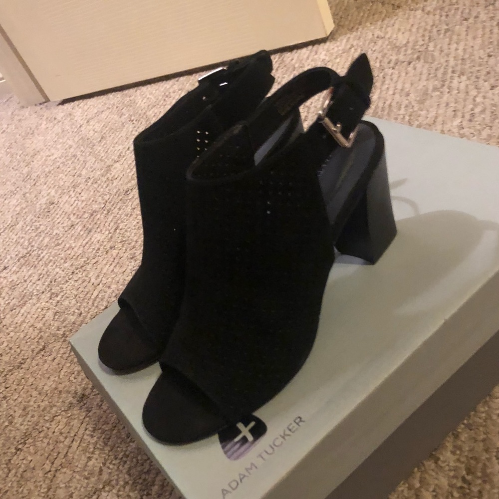 Adam Tucker Heels